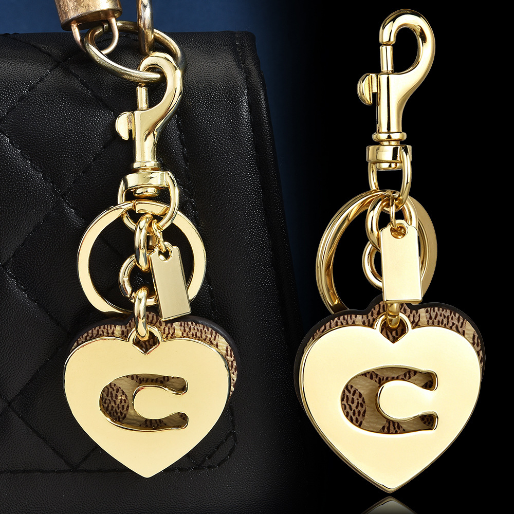 พวงกุญแจหนังลายดอกไม้รูปหัวใจพ - Monogram Keychain Leather บทวิจารณ์และราคา